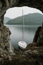 White Sailboat on Body of Water