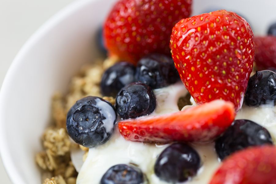 Acai bowl with mixed berries and granola