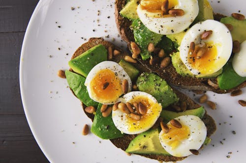 Free Pastry and Boiled Egg on Plate Stock Photo