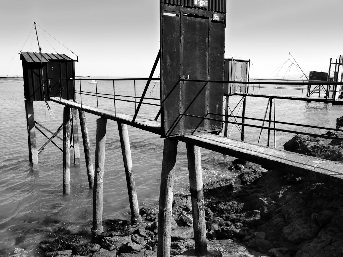 Cook preparing traditional dish in a small kitchen