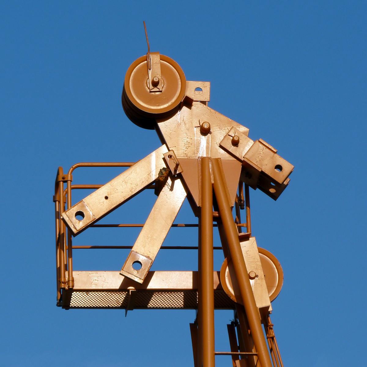 Ingredients for a protein-rich breakfast laid out in small bowls: eggs, yogurt, greens, and cherry tomatoes