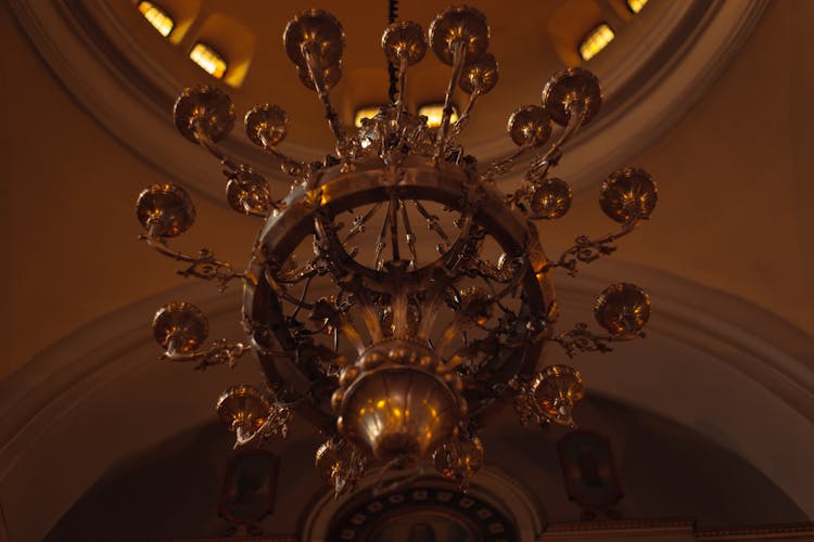 Close-up Photo Of Brass Uplight Chandelier 