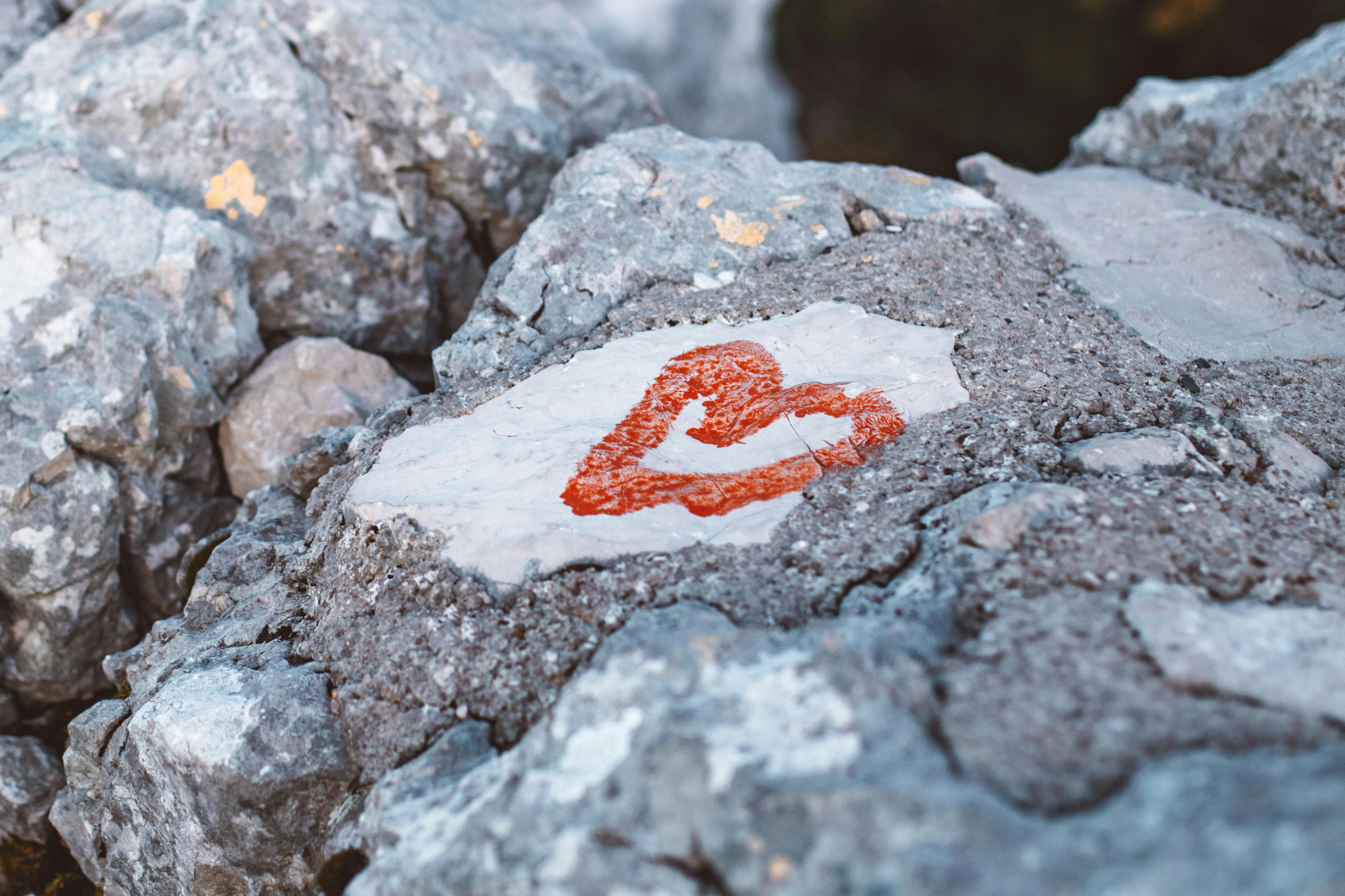 heart drawing on rock formation