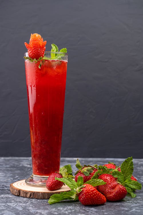 Fresh Strawberry Juice in Clear Drinking Glass