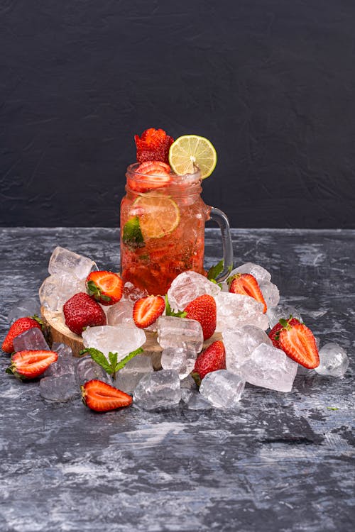 Sliced Strawberry Fruit on a Cold Drink 