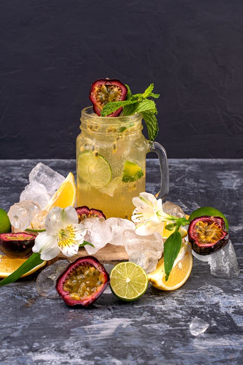 Sliced Lime and Passion Fruit on an Ice Cold Drink 