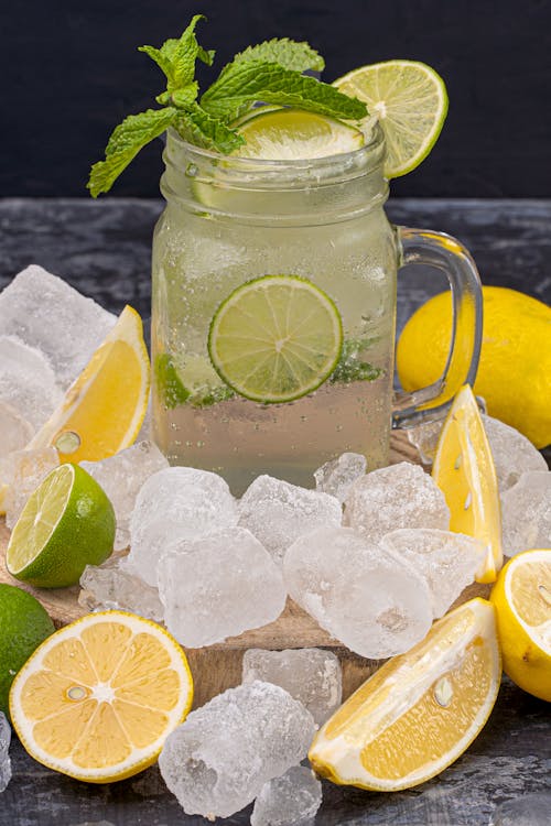 Close-up Photo of Mint and Lime Cold Drink 