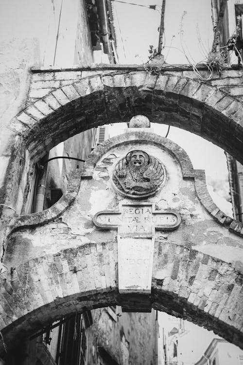 Monochrome Photo of Arched Structure