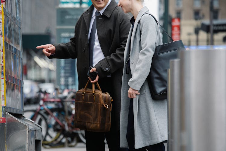 Crop Coworkers Buying Lunch In Food Truck