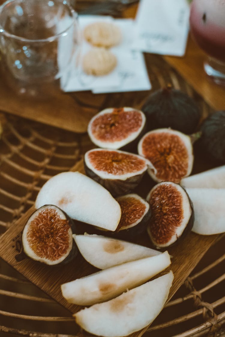 Close-up Photo Of Sliced Pear And Figs 