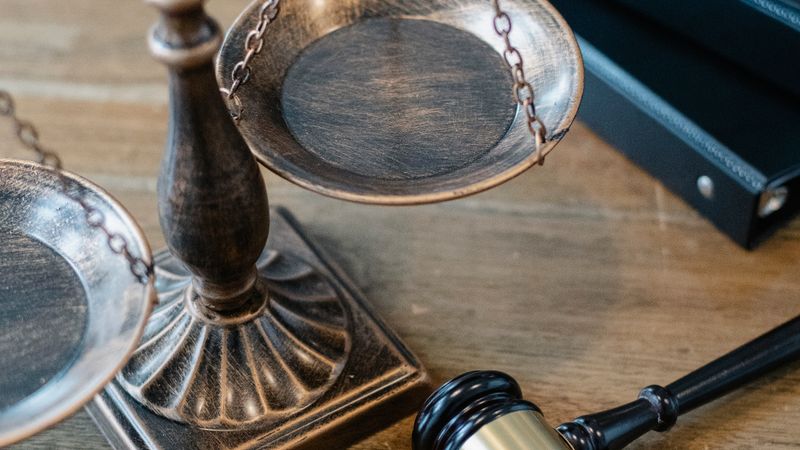 Legal documents and CBD products showing is CBD legal compliance