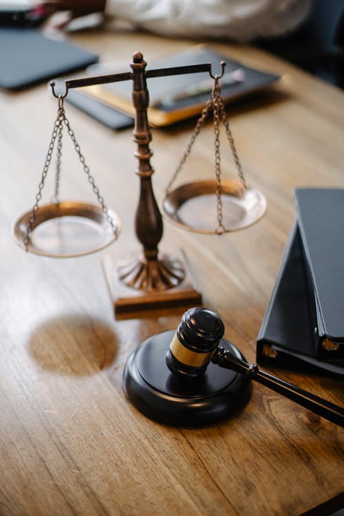 Free Judges desk with gavel and scales Stock Photo