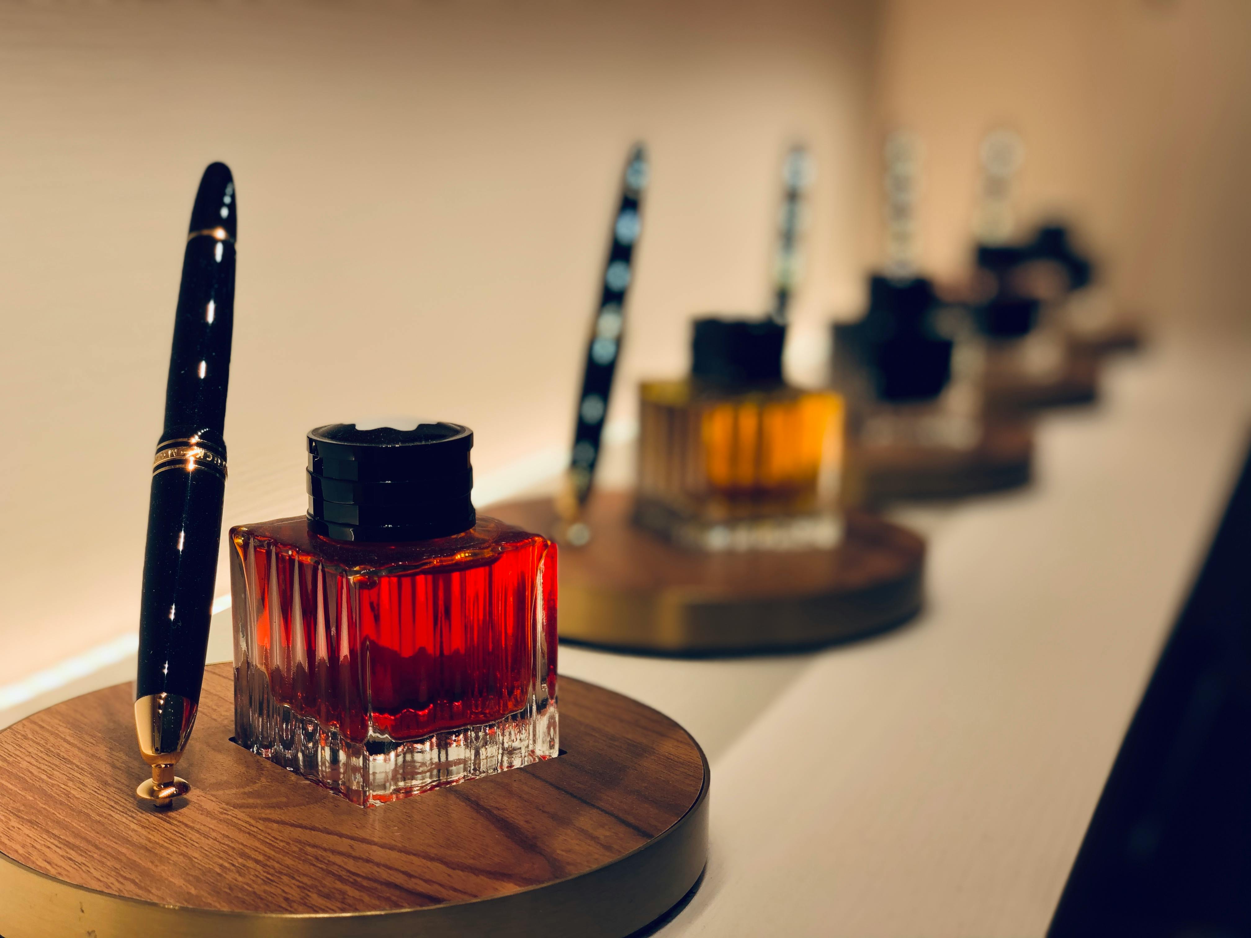 Coloful Inks in Vials and Fountain Pens · Free Stock Photo