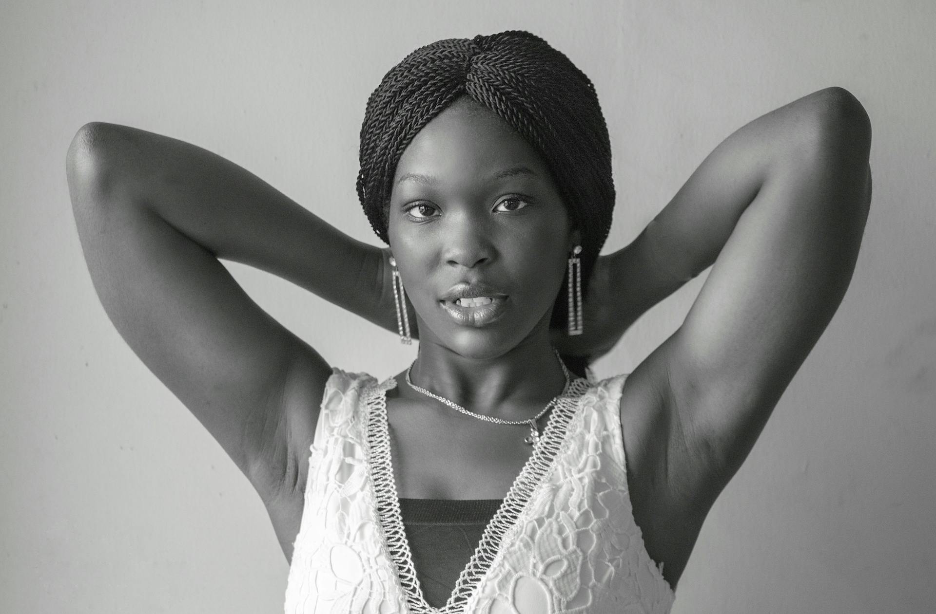 Woman with Cornrow Holding her Hair