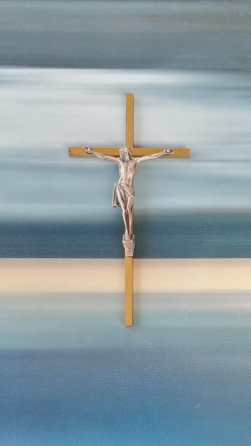 Crucifix on a Colorful Wall