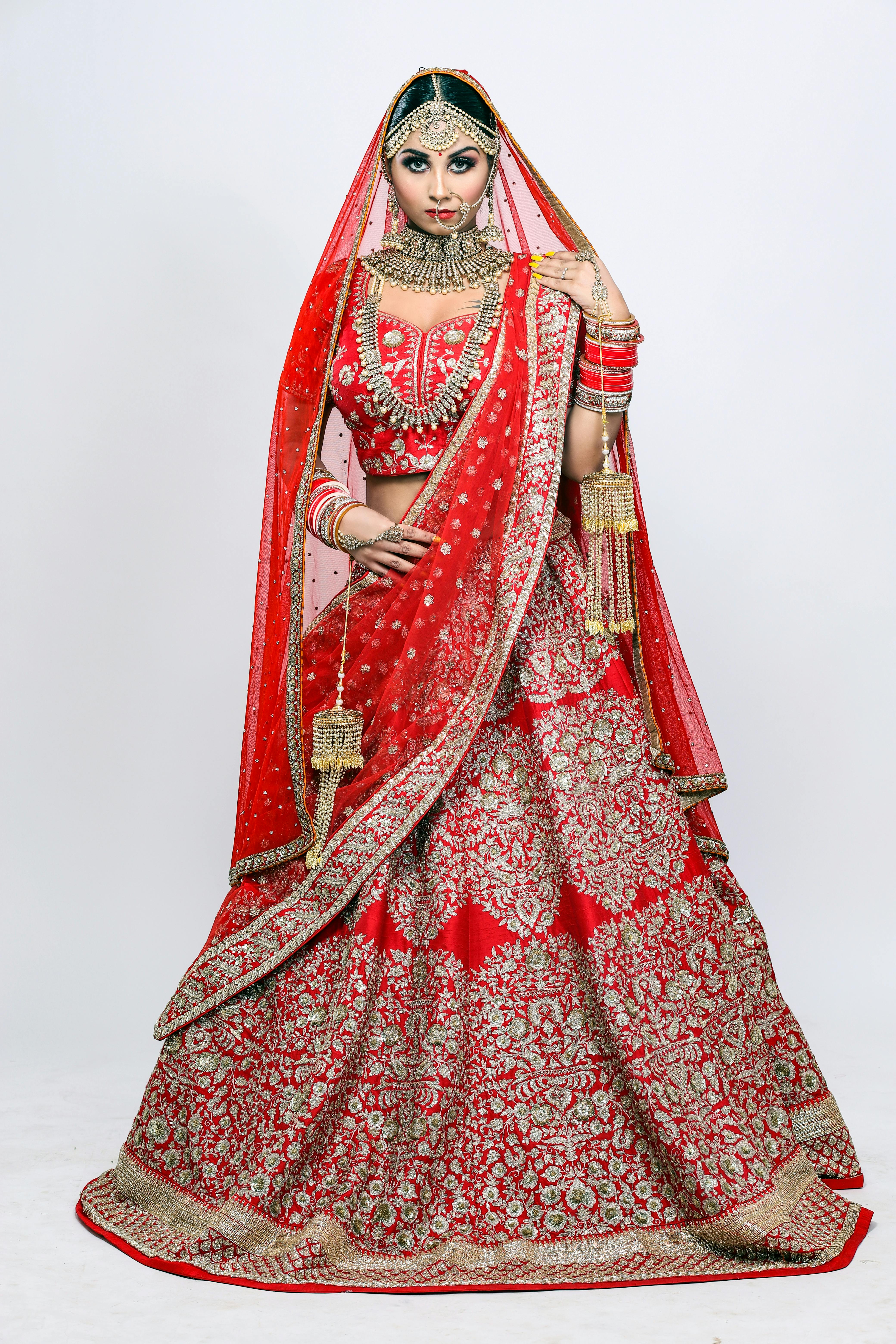Woman in Red and White Floral Dress