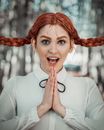 Woman in White Collared Shirt With Red Hair