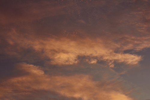 Free Capture the beauty of nature with these dramatic sunset clouds against a vibrant sky. Stock Photo