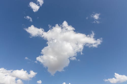 Free Fluffy Cloud on a Blue Sky  Stock Photo