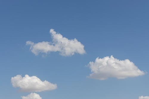 Fluffy Clouds on a Blue Sky 