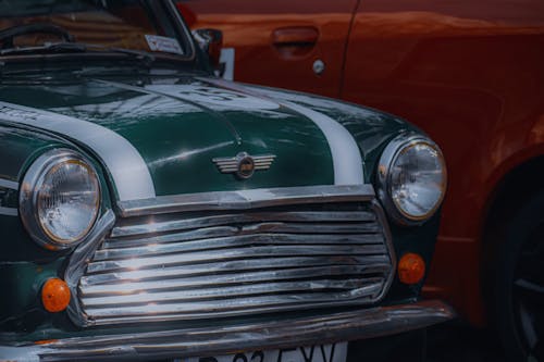 Hood of old green car