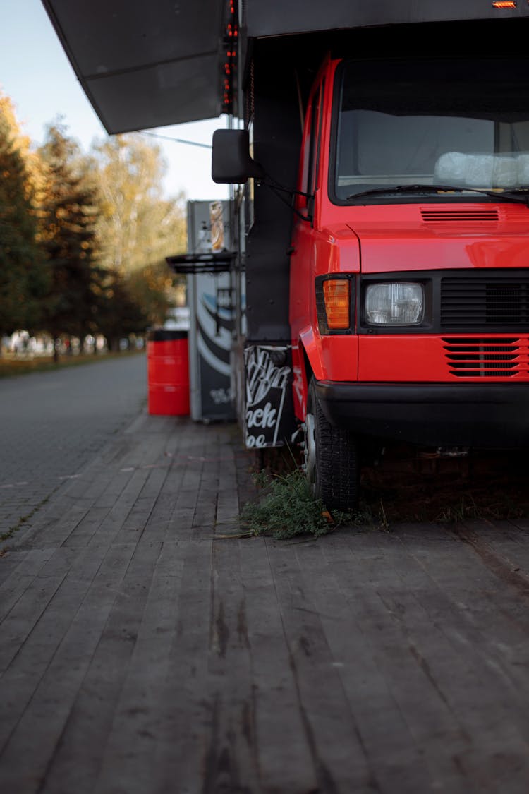 Red And Black Car On Road