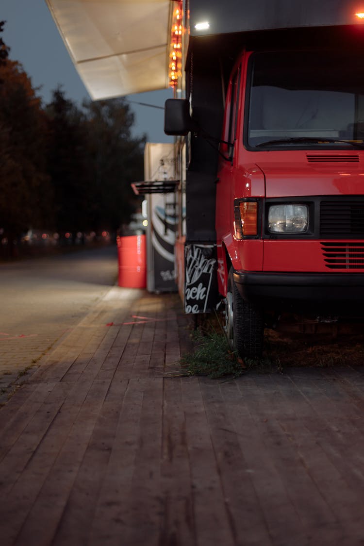 Red And Black Truck On Road