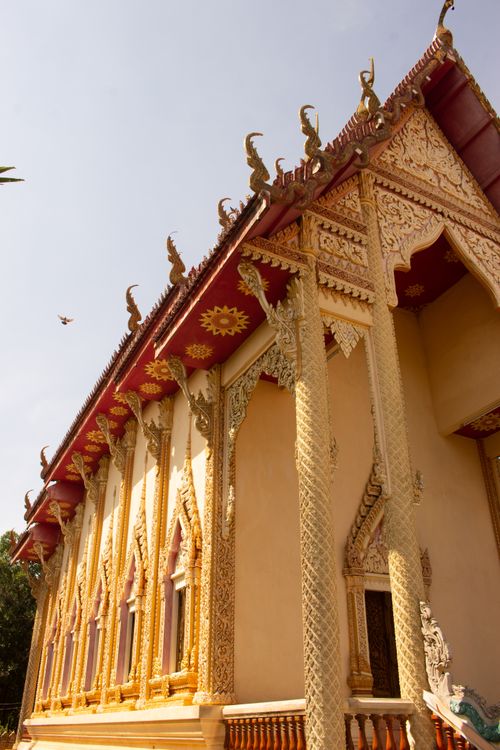 Buddhist temple exterior with golden ornaments · Free Stock Photo