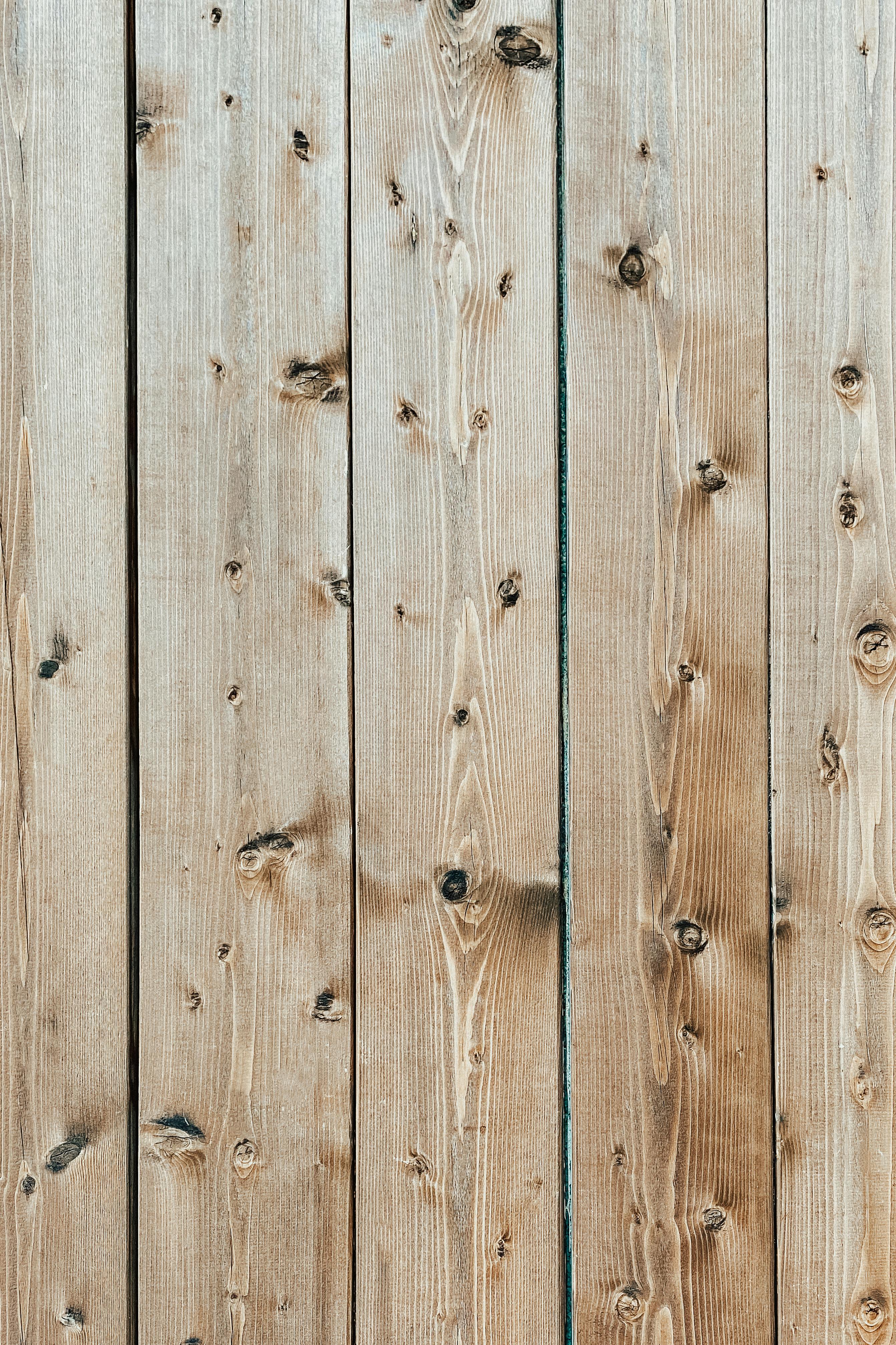 Background of light brown wooden boards · Free Stock Photo