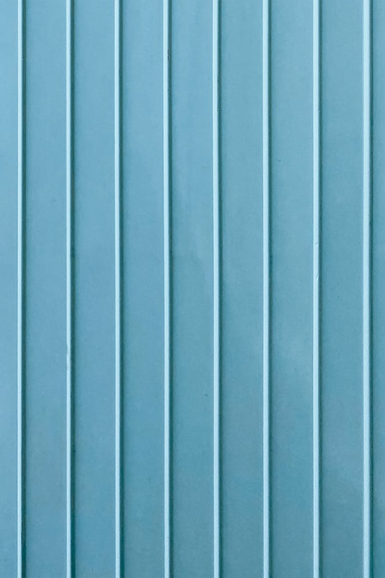 Vertical Lines On Blue Wall