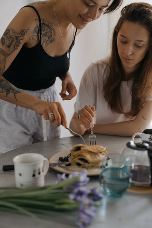 Free Female Friends getting Pancake  Stock Photo