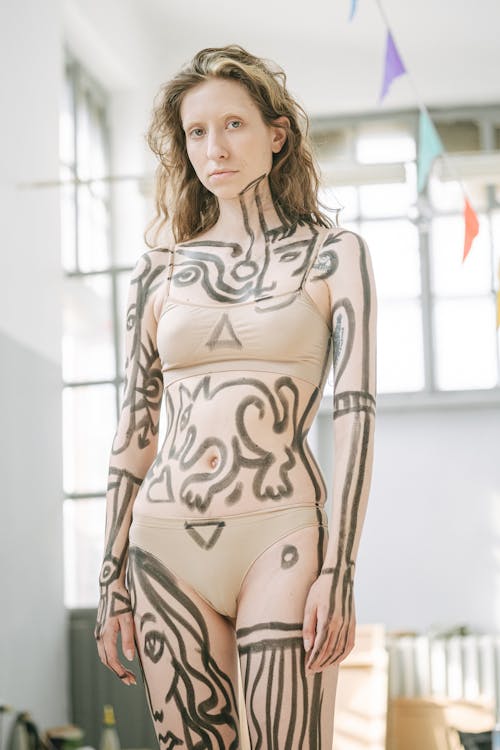 A Woman with Black Body Paint