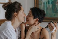 Man and Woman Kissing Each Other