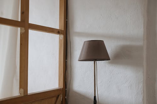 A Lamp by a White Wall