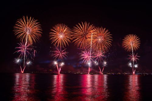 Free Vibrant fireworks illuminating the night sky over Istanbul, reflecting beautifully on the water. Stock Photo