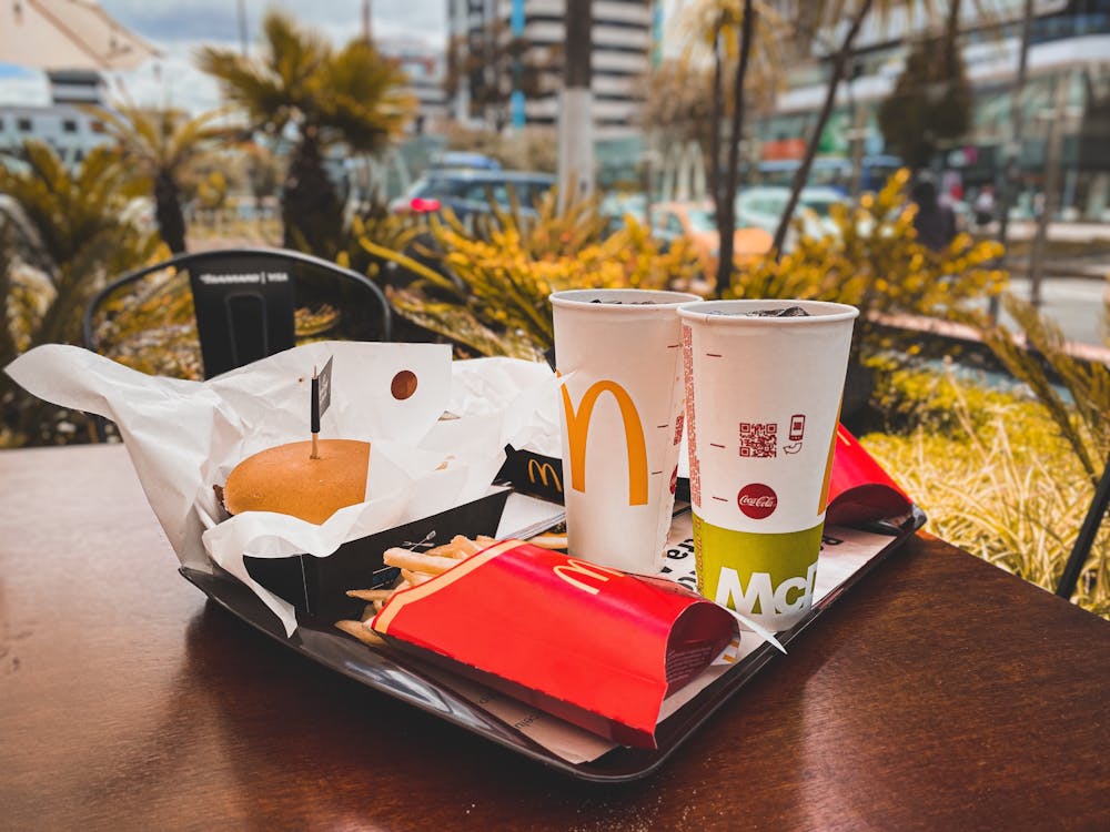 Free Hamburger and Drinks on a Tray Stock Photo