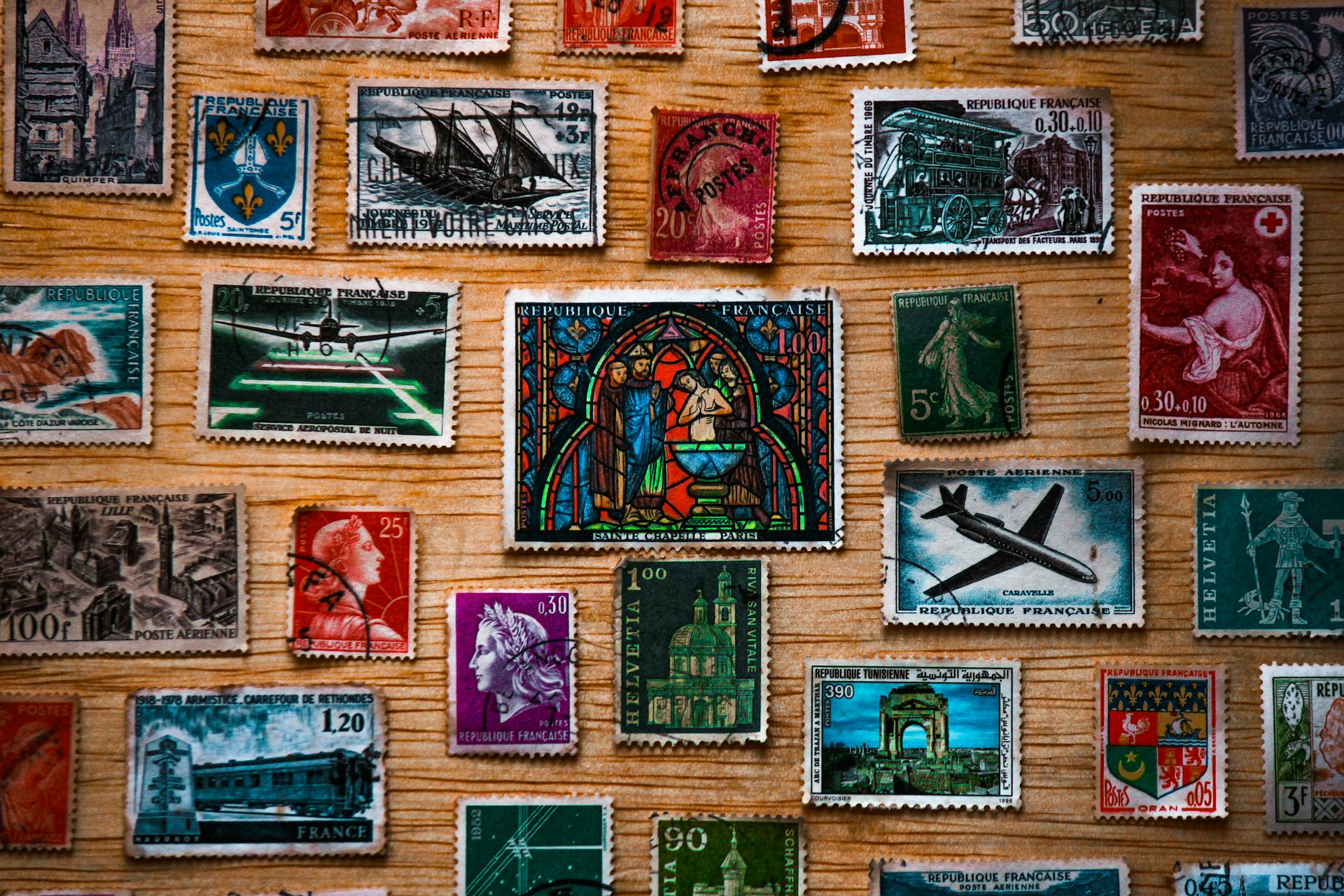 Postcards on a Wooden Wall