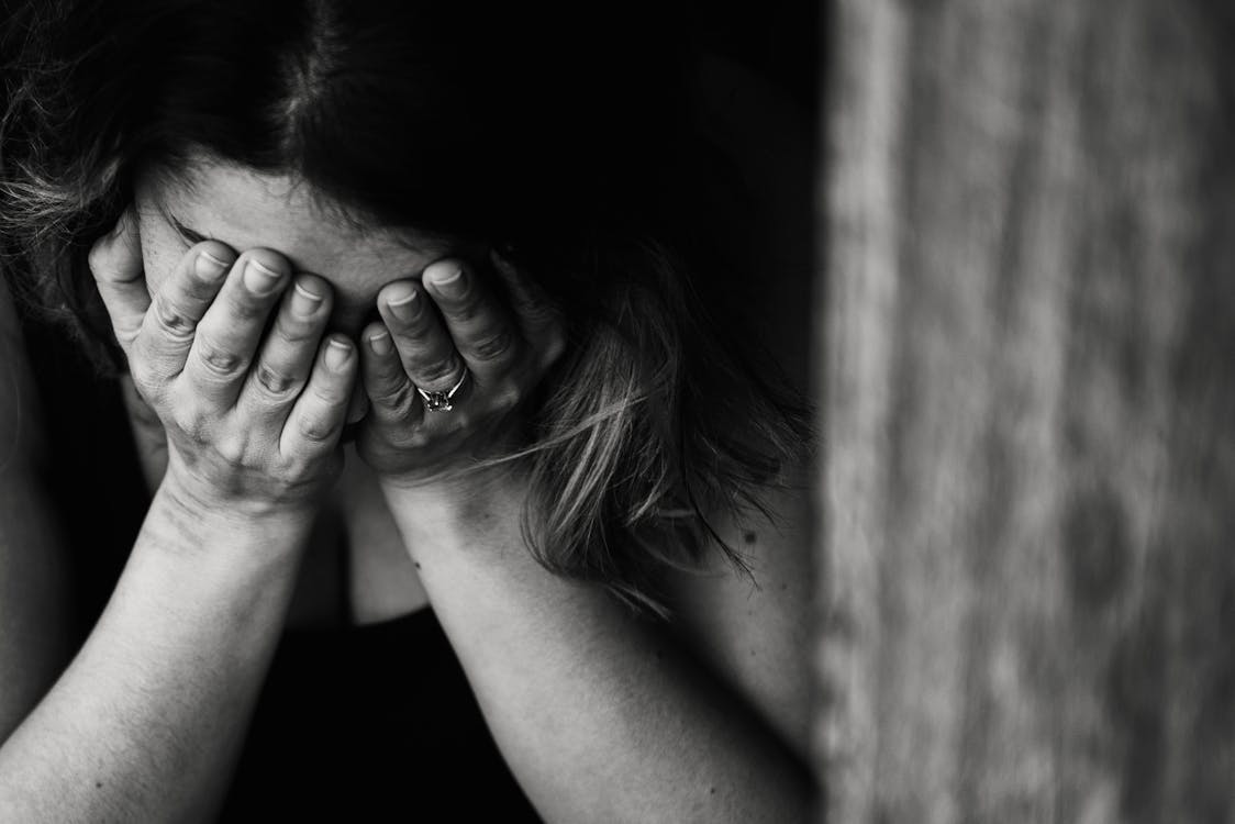 Free Grayscale Photography of Crying Woman Stock Photo