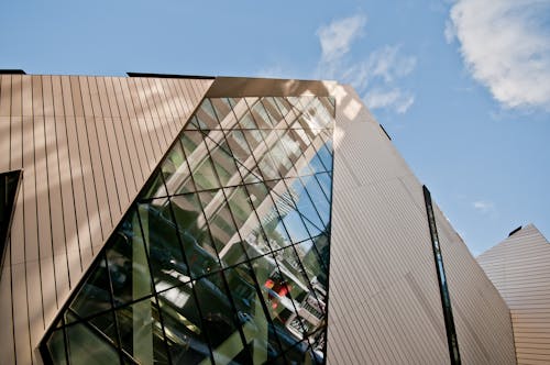 Low Angle Photo of Building Under Blue Sky