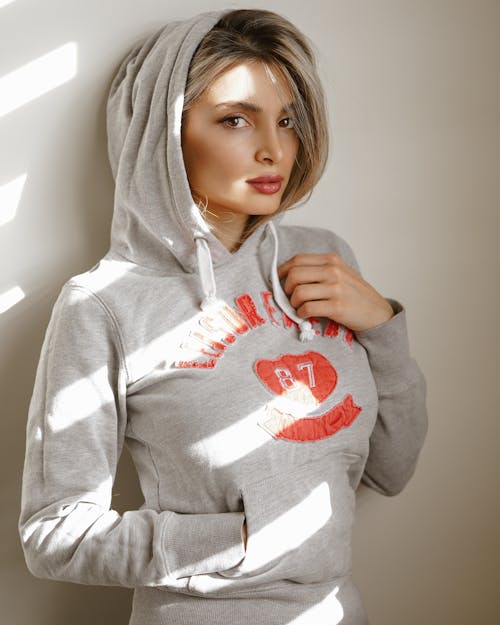 A Woman in Gray Hoodie