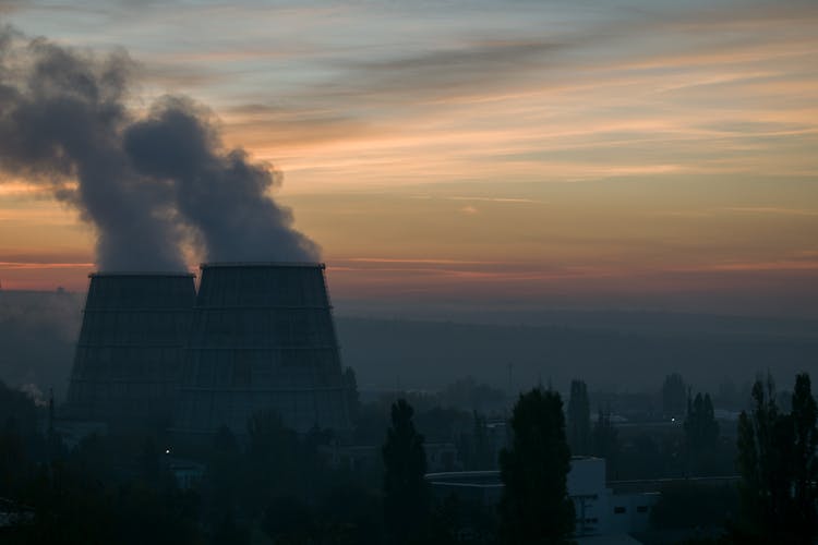 An Industrial Plant Chimney Emitting Smoke