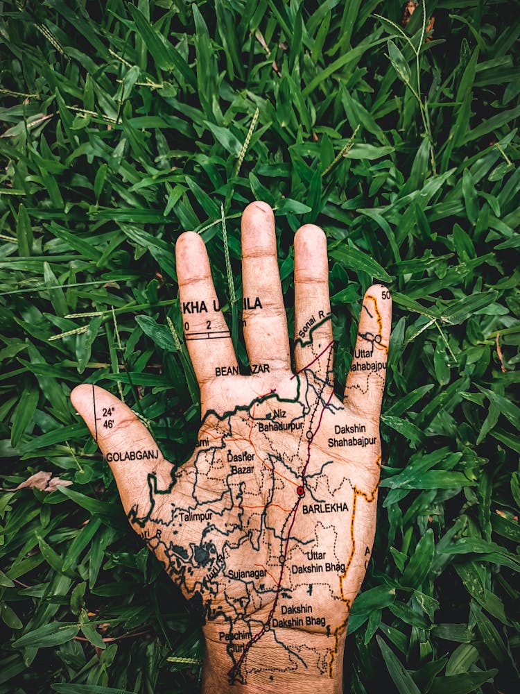 A Hand On A Map