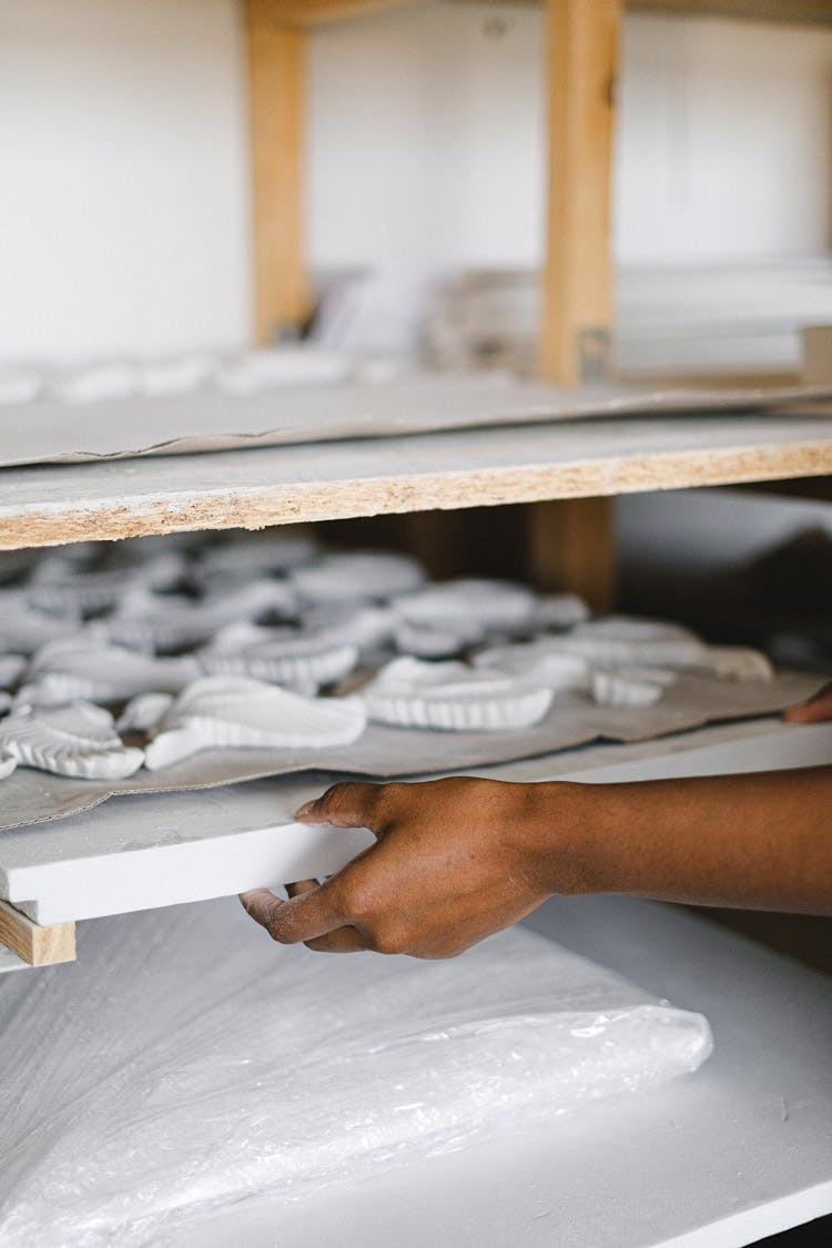 Figurines Of White Birds In Workshop