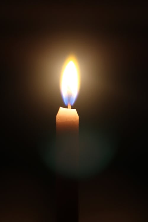 A Lighted Candle in Dark Room