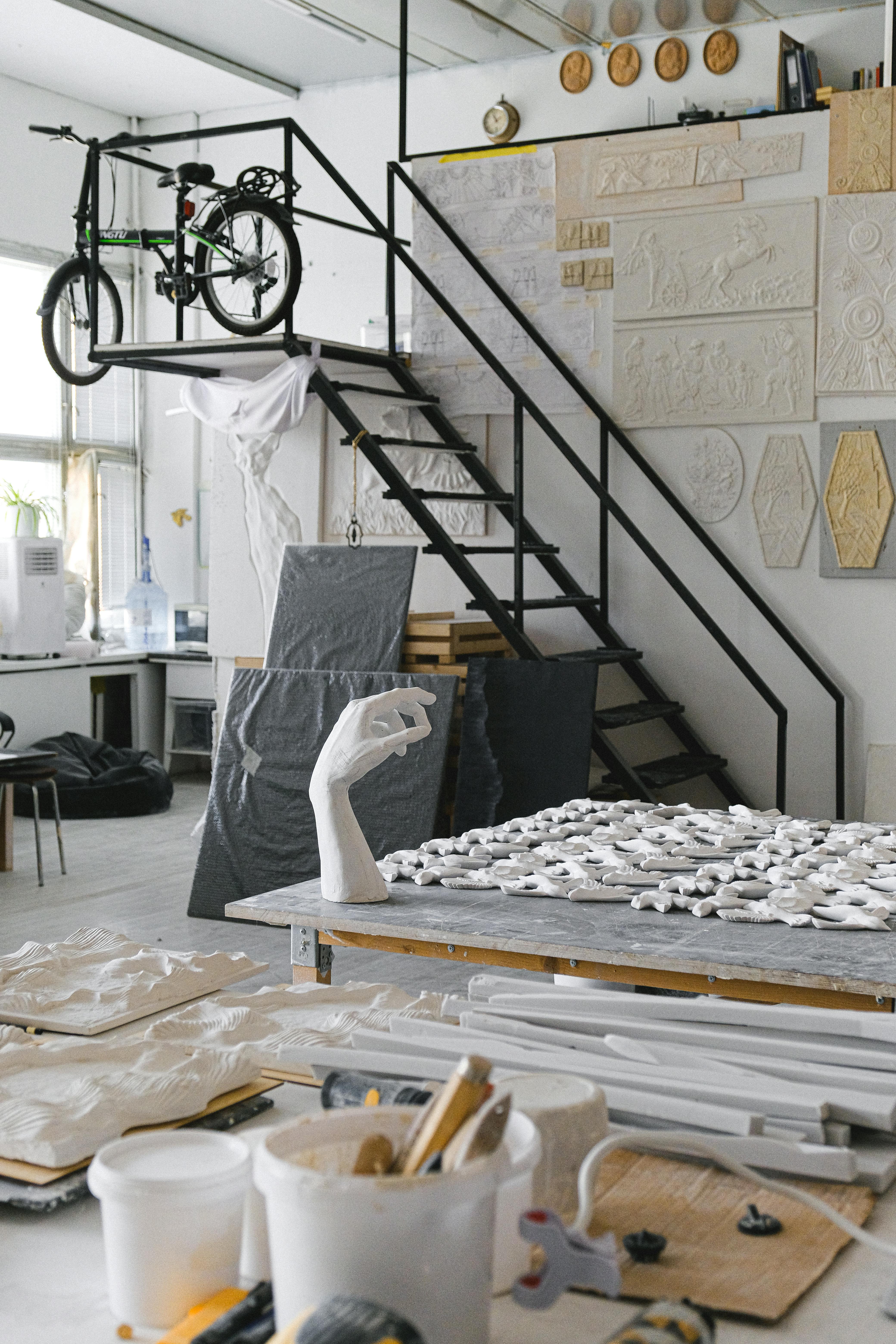 black and white bicycle near white and brown wooden table