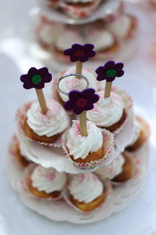 Cupcakes with Icing and Floral Decoration