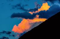 Card artwork: mountain silhouette at sunset, photo by eberhard grossgasteiger on Pexels