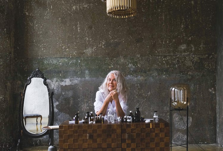 A Woman Behind A Desk