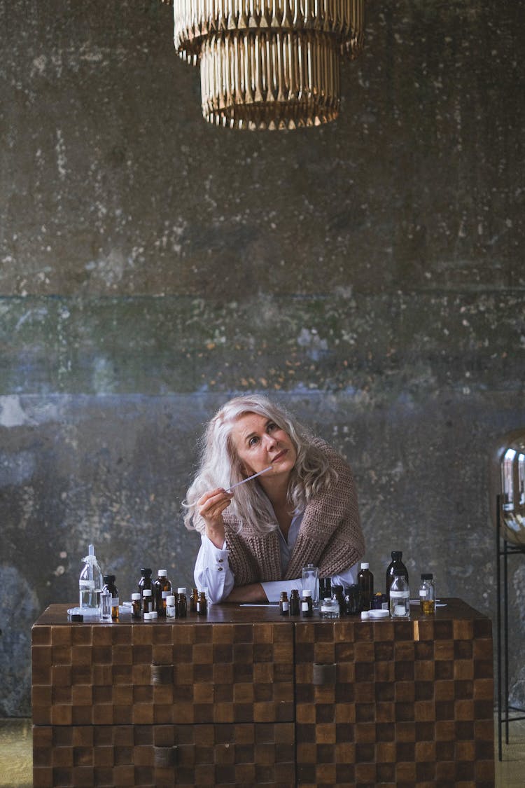 A Woman Standing At The Table