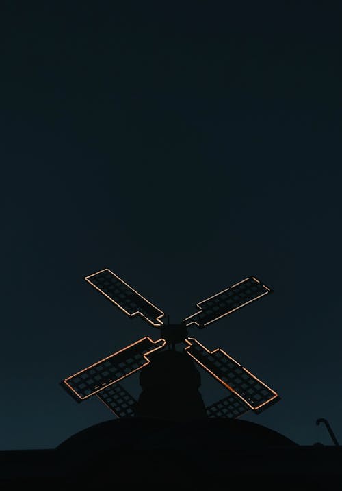 Silhouette of Windmill During Night Time 